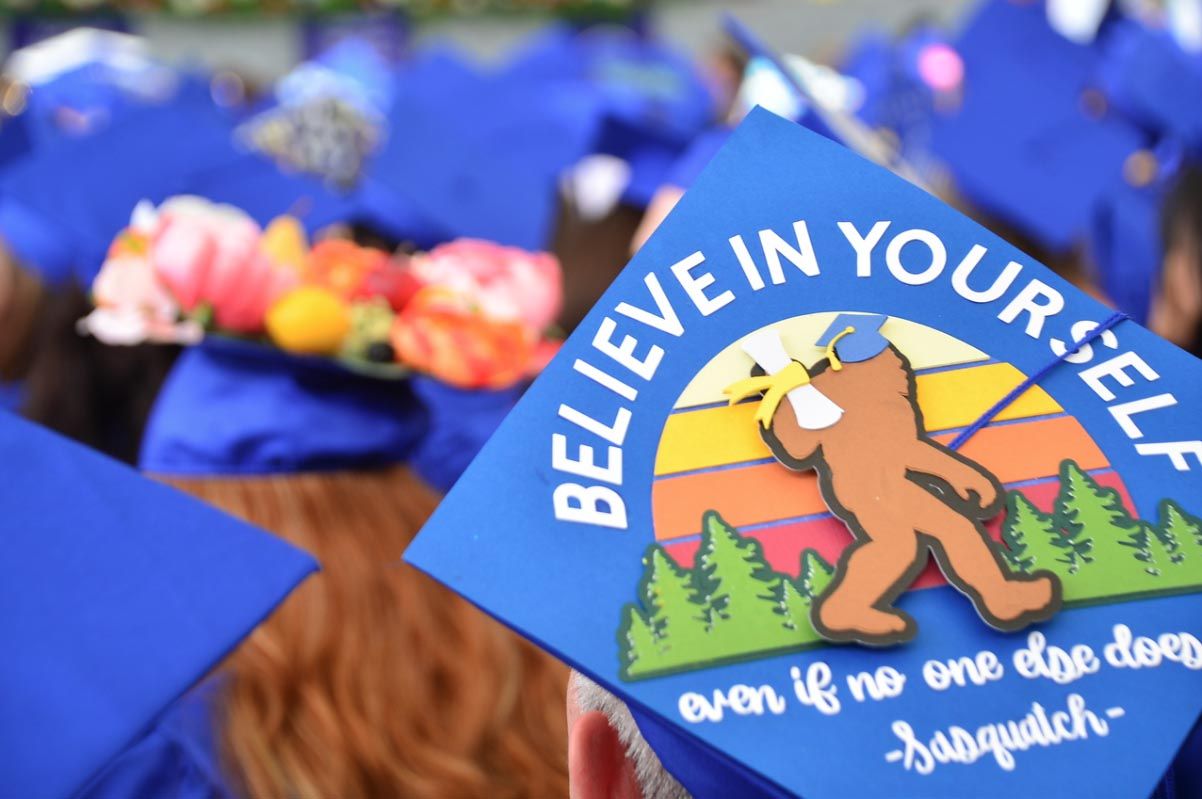 Graduation Cap Decorated with Text that reads Believe in Yourself even if no one else does by Sasquatch